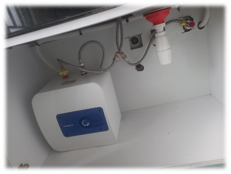 kitchen sink and under sink heater.